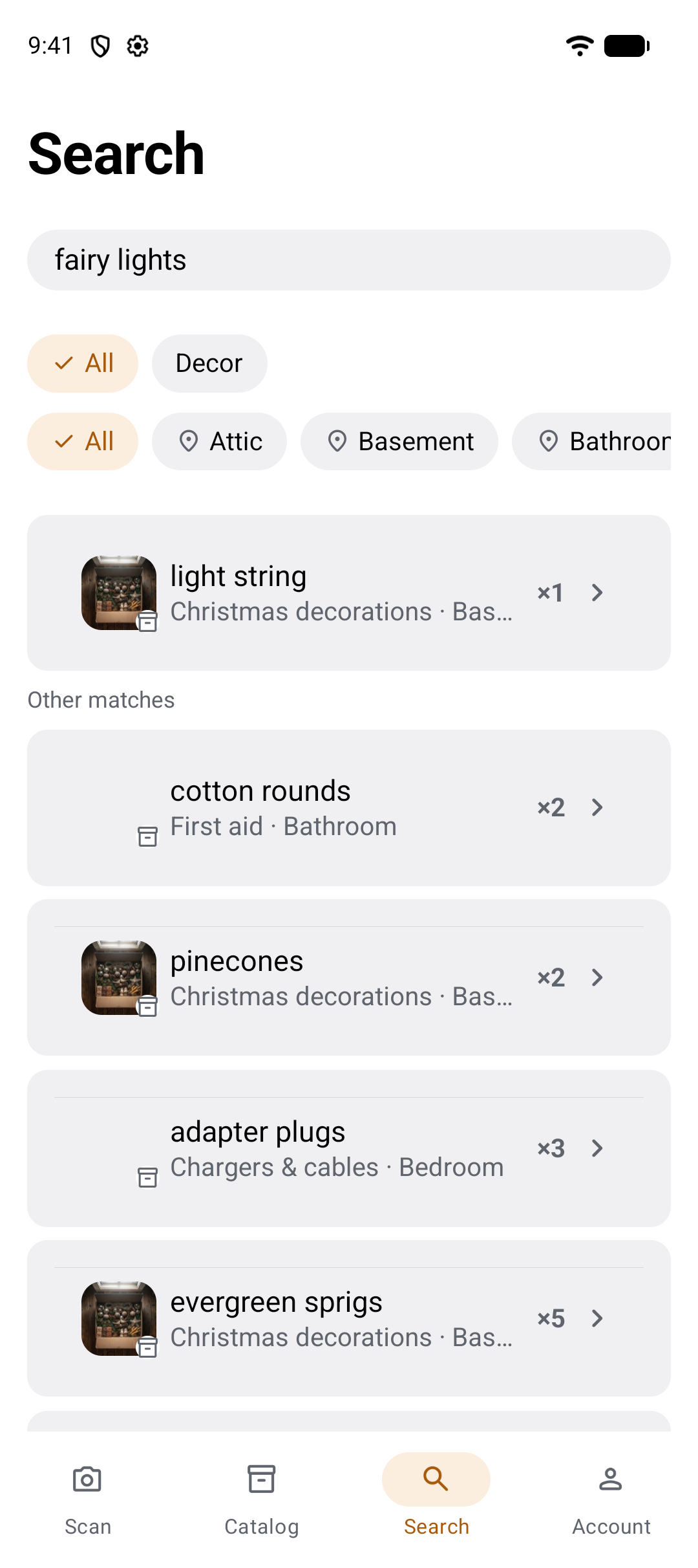 The Search tab with the query fairy lights: category and room filter chips, then the closest match — light string, in Christmas decorations in the basement — followed by a section headed Other matches with cotton rounds, pinecones, adapter plugs and evergreen sprigs.